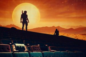 sala de cinema com filmes de aventura passando na tela